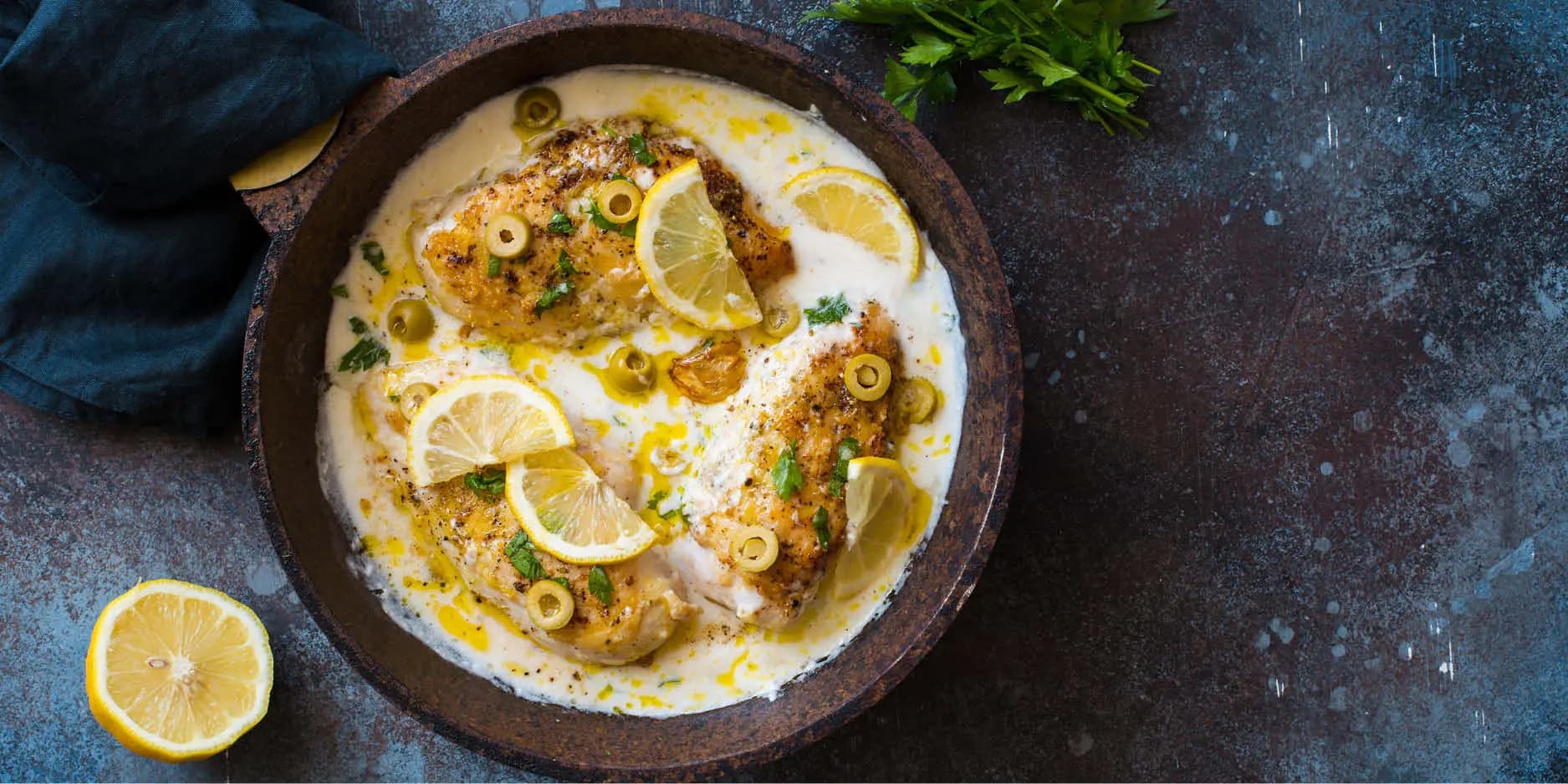 Scaloppine di pollo gratinate con salsa panna e limone